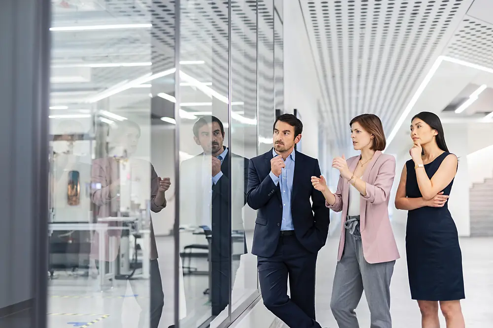 Customers during a tour in front of the Automated Lab